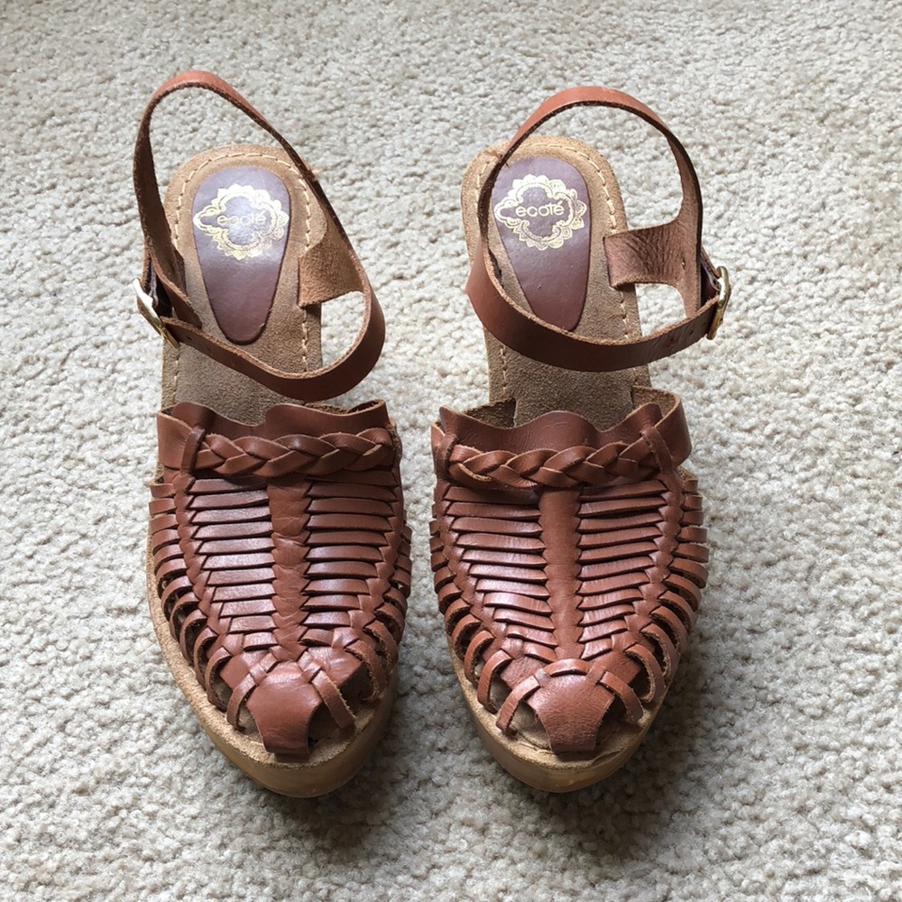 Brown woven clogs